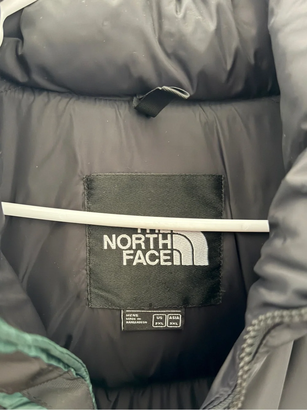 The North Face 700 puffer jacket in black/green color-blocked design, size XXL